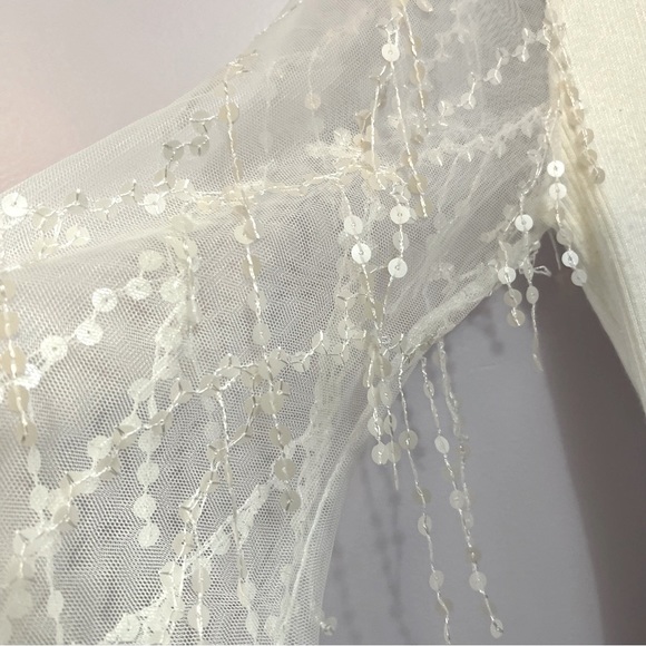 Cato Small White Knitted Dress with Long Mesh Sleeves and Dangly Sequins - Picture 4 of 9